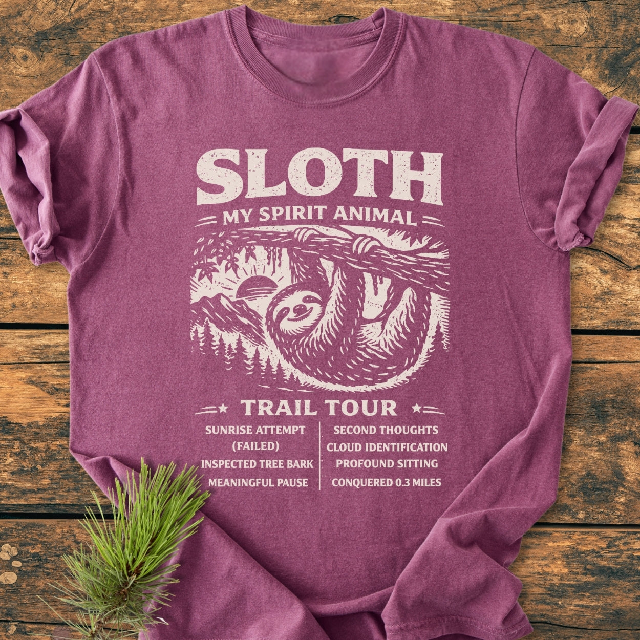 Sloth Spirit Animal Tour - Vintage Wash Tee features a smiling sloth design with tour highlights on a heathered purple background, showcasing a relaxed fit and durable stitching.