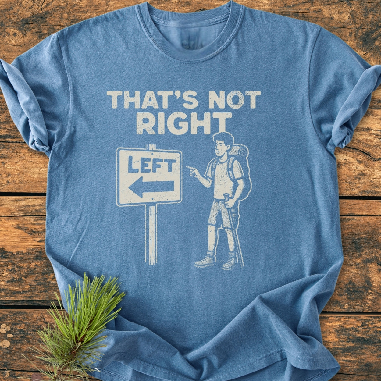 That's Not Right - Vintage Wash Tee featuring a clever visual pun with a hiker and road sign print, offering a relaxed fit and durable construction with double-needle stitching, perfect for daily wear.