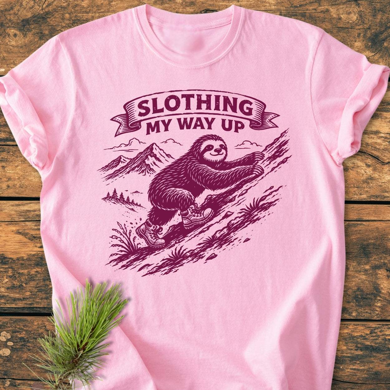 Slothing My Way Up - Vintage Wash Tee features a playful sloth illustration on a light-pink T-shirt, highlighting its cozy, relaxed fit and durable design, perfect for everyday wear.