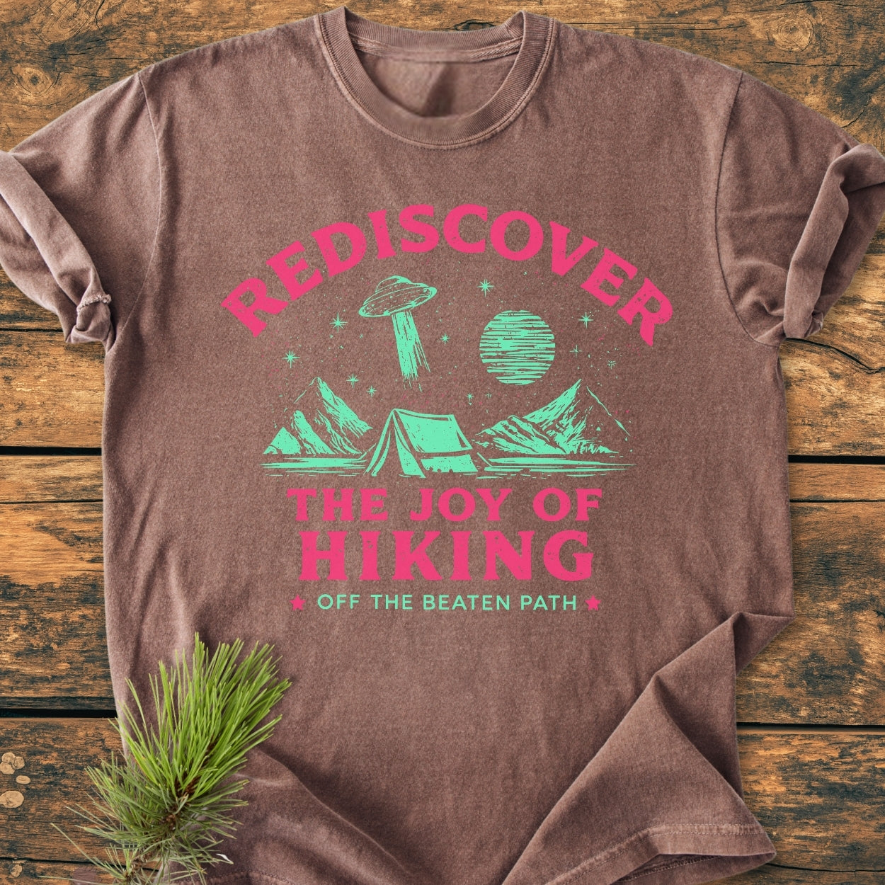 Rediscover The Joy Of Hiking - Vintage Wash Tee features a stylized outdoor scene with mountains, tent, starry sky, and UFO, emphasizing durability and comfort with its relaxed fit and garment-dyed cotton.
