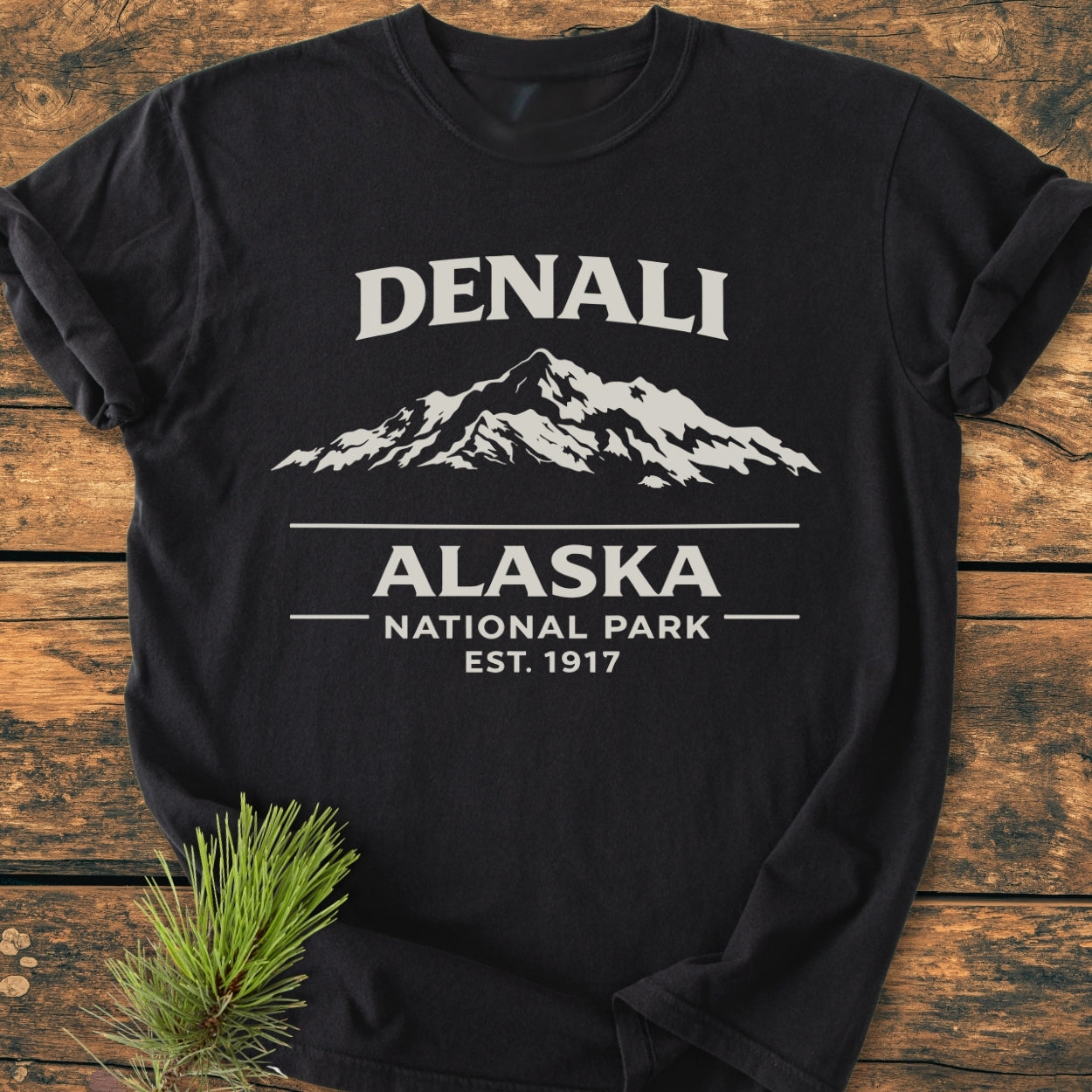 Denali Alaska National Park - Vintage Wash Tee features a stylized mountain graphic with DENALI above, ALASKA NATIONAL PARK and EST. 1917 below, on soft, garment-dyed cotton.