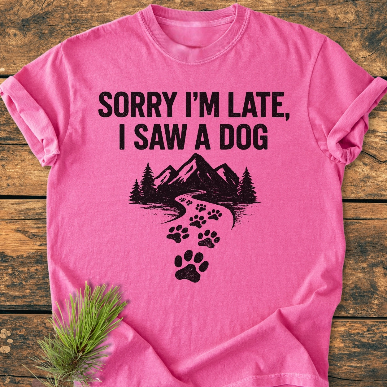 Sorry I'm Late - Vintage Wash Tee featuring bold text and a mountain scene with dog paw prints; a soft, relaxed fit made of durable ring-spun cotton, perfect for everyday wear.