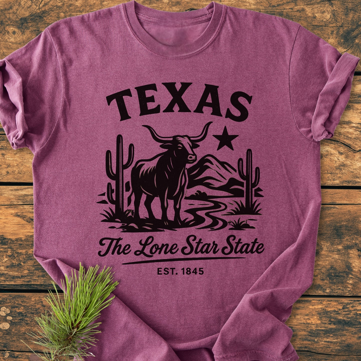 Texas, The Lone Star State - Vintage Wash Tee: Heathered purple T-shirt featuring a longhorn steer graphic, TEXAS, and The Lone Star State script. A pine branch accents the shirt's corner.