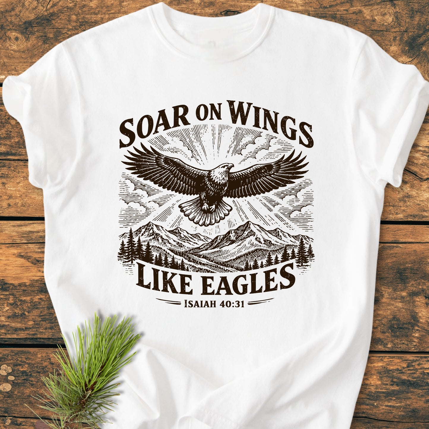 Soar On Wings Like Eagles Isaiah 40:31 - Vintage Wash Tee featuring a vintage-style eagle design with mountains, crafted from soft, pre-shrunk 100% cotton, offering a relaxed fit for everyday comfort.