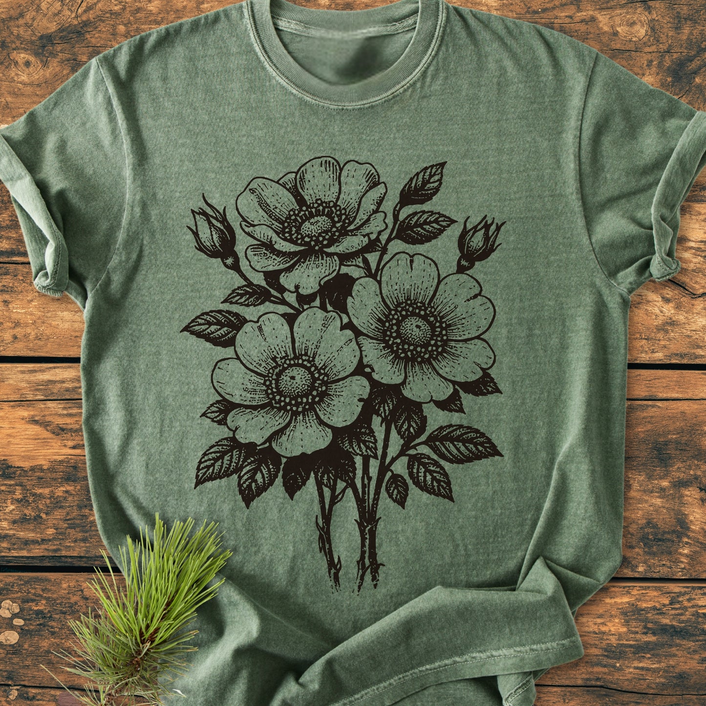 Wild Rose Bouquet - Vintage Heavyweight Tee features a botanical line drawing of open flowers and buds screen-printed in black on a heather-green, relaxed-fit, durable Comfort Colors 1717 garment-dyed T-shirt.
