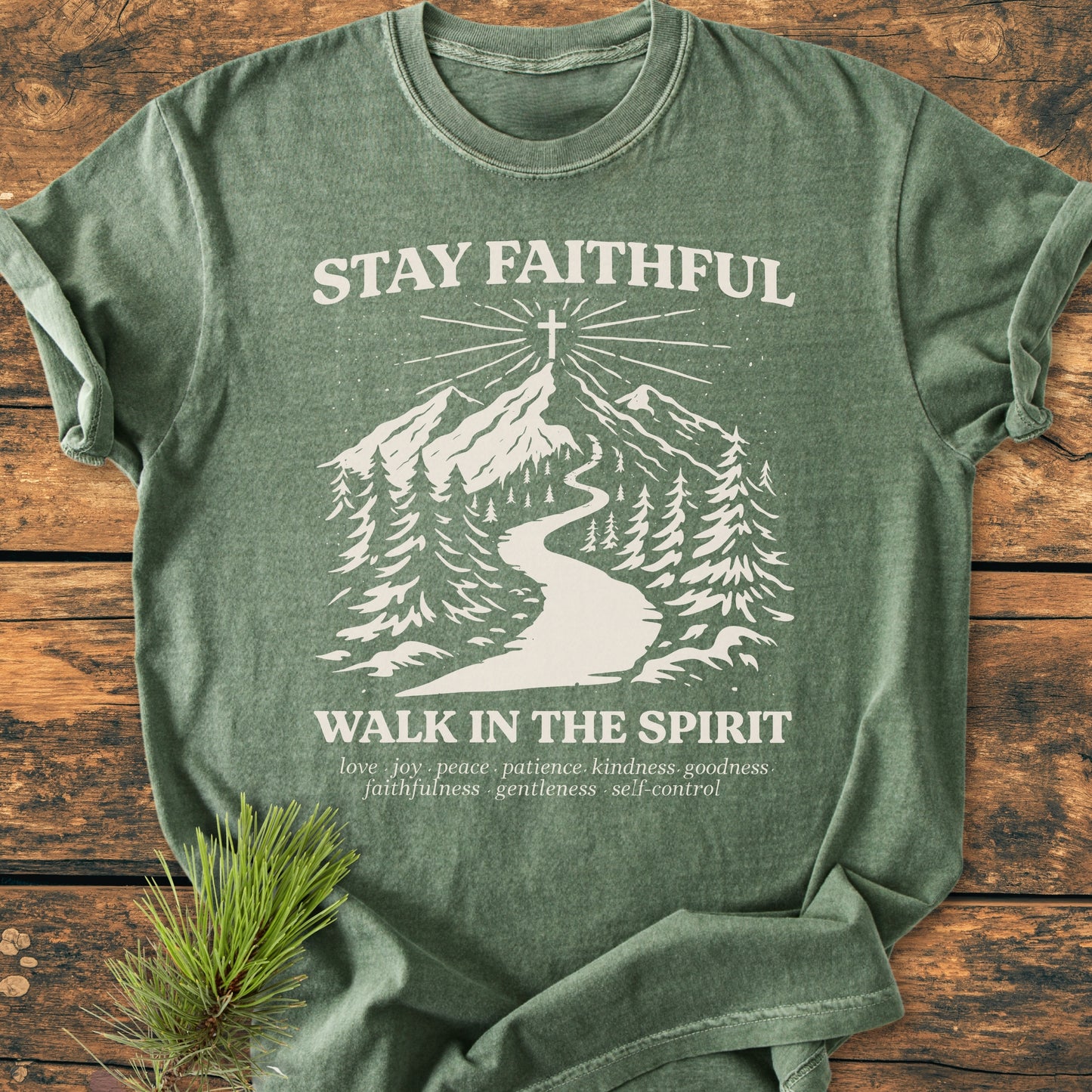 Stay Faithful - Vintage Heavyweight Tee featuring a mountain path graphic with virtues listed beneath, laid on wood. Offers a cozy fit with durable stitching, ideal for everyday wear.