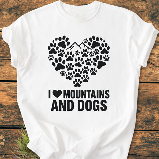 Paw Heart Dog Lover - Vintage Heavyweight Tee featuring a heart-shaped arrangement of black paw prints and mountain silhouette, with “I ♥ MOUNTAINS AND DOGS” text on a soft, relaxed-fit white T-shirt.