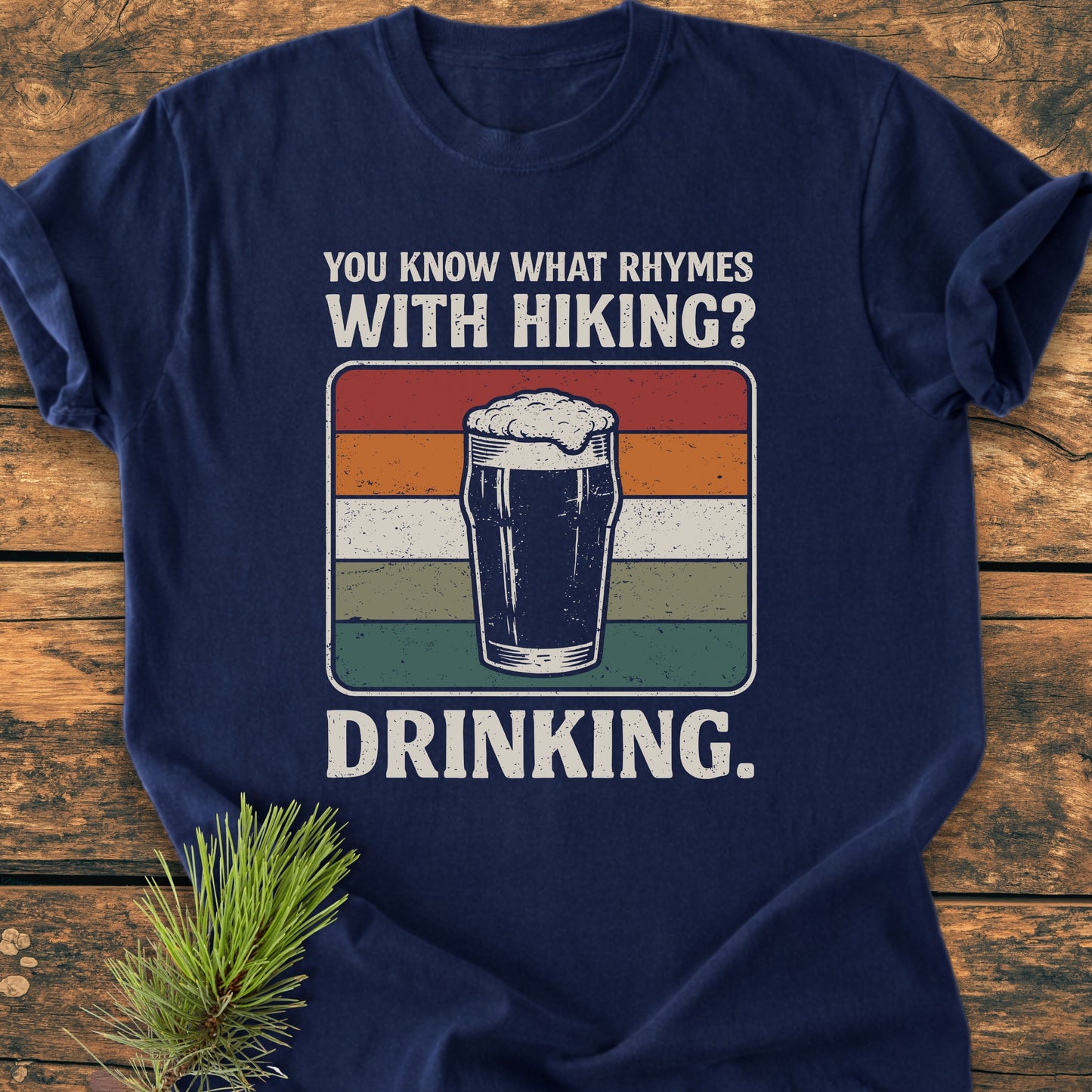 What Rhymes With Hiking? - Vintage Wash Tee features a frothy pint glass graphic with humorous text, perfect for trail enthusiasts who appreciate a good post-hike drink.