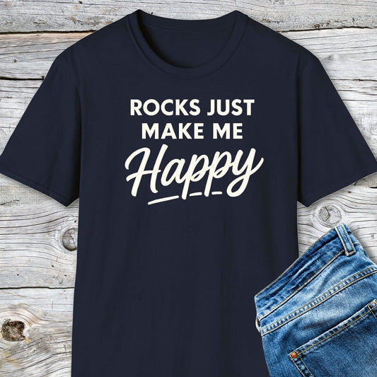 Navy-blue Rocks Make Me Happy T-shirt displayed with blue jeans, featuring durable white slogan print, crafted from soft, ring-spun cotton for outdoor adventures.