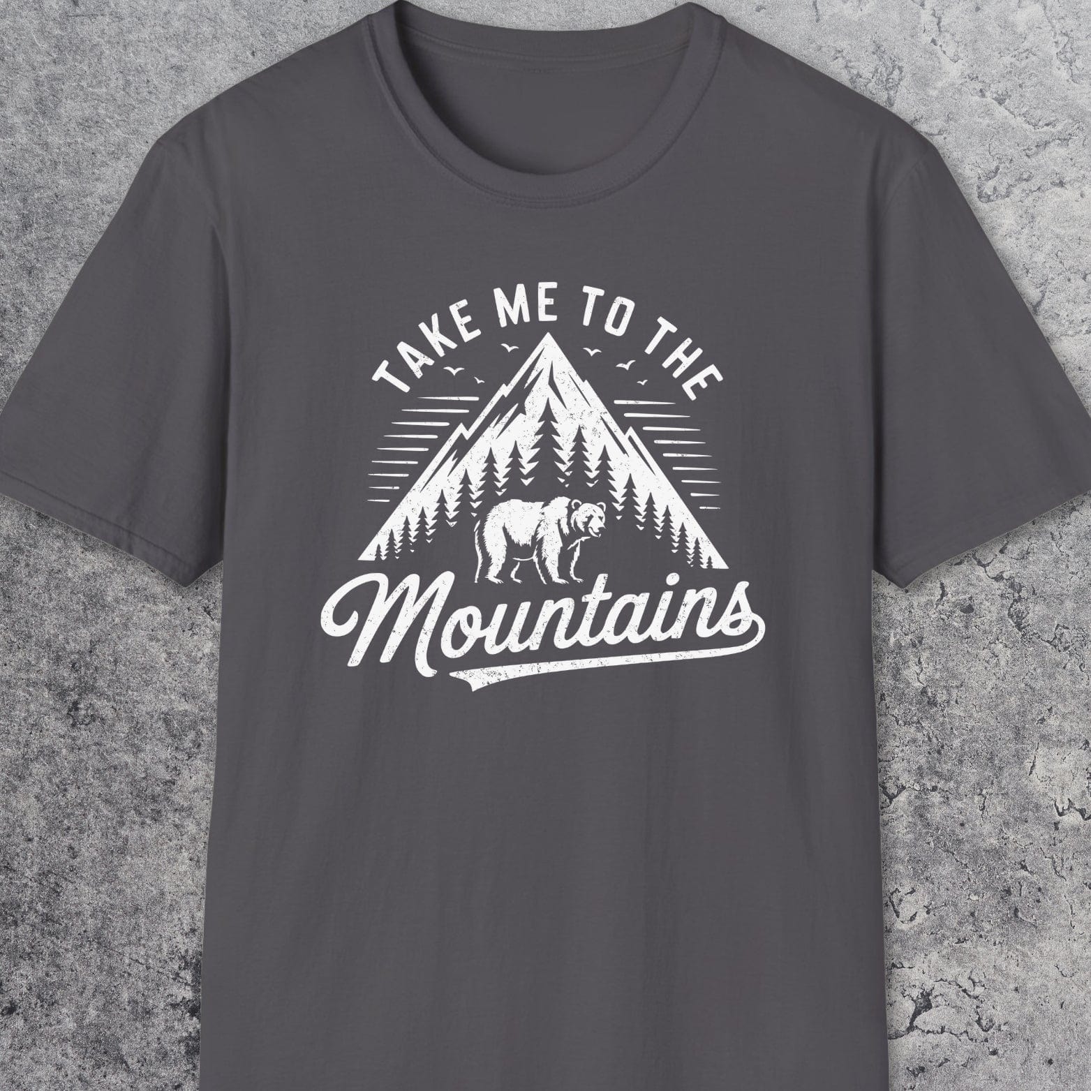 Take Me To The Mountains T-Shirt with a mountain, trees, bear graphic. Soft cotton, unisex fit, ideal for outdoor adventures and casual wear.
