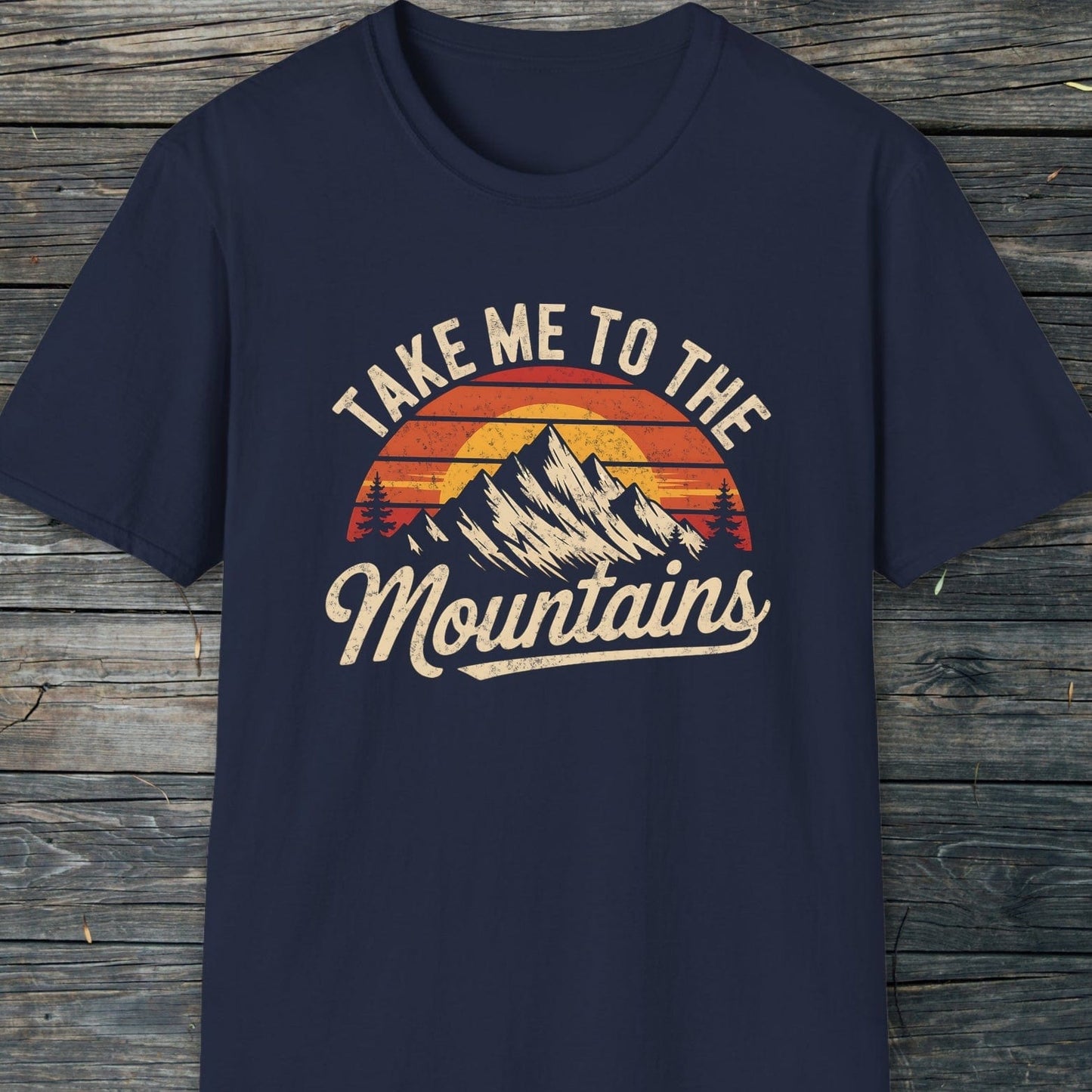Take Me To The Mountains T-Shirt with retro mountain graphic and TAKE ME TO THE Mountains script, designed for comfort and adventure with a unisex fit.
