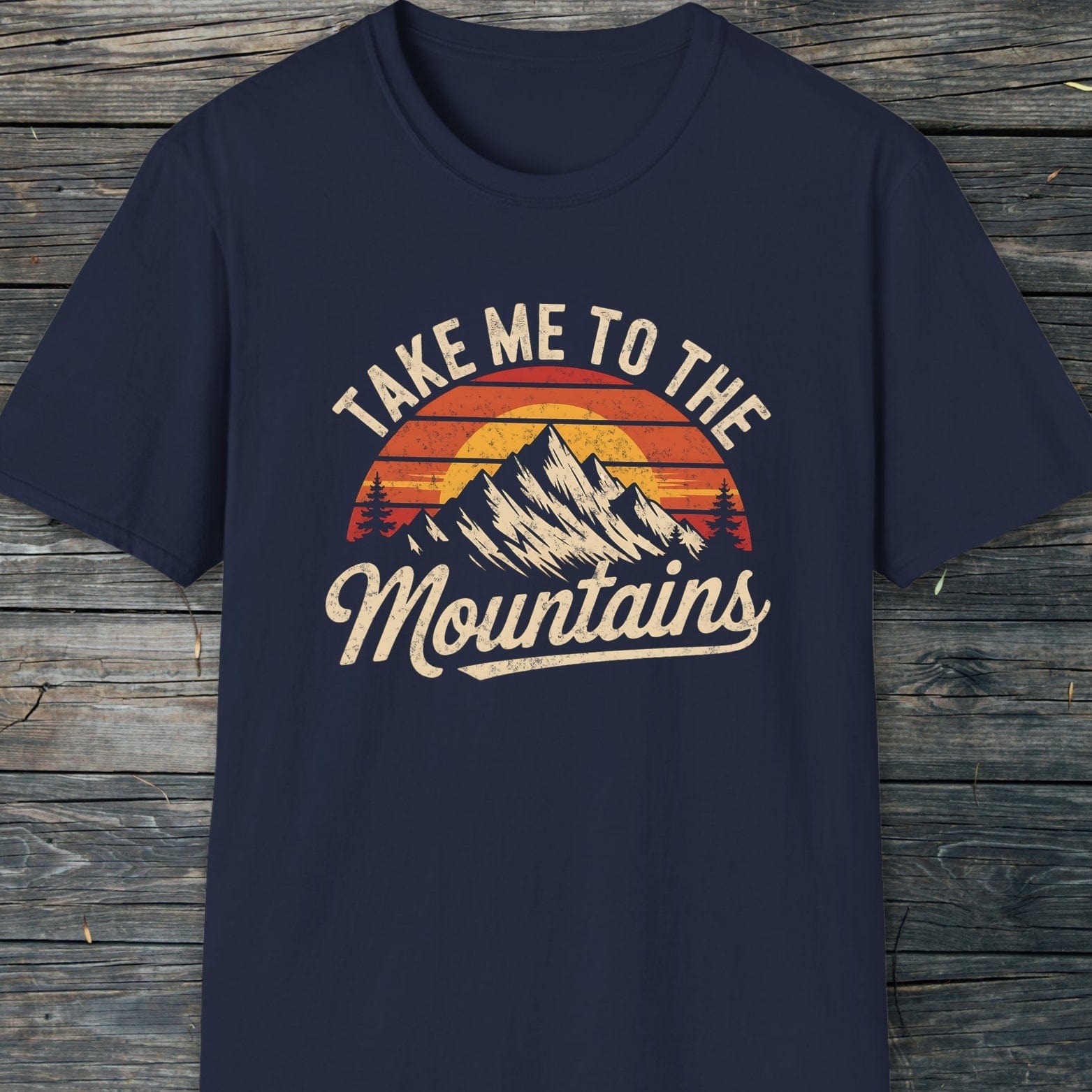 Take Me To The Mountains T-Shirt with retro mountain graphic and TAKE ME TO THE Mountains script, designed for comfort and adventure with a unisex fit.