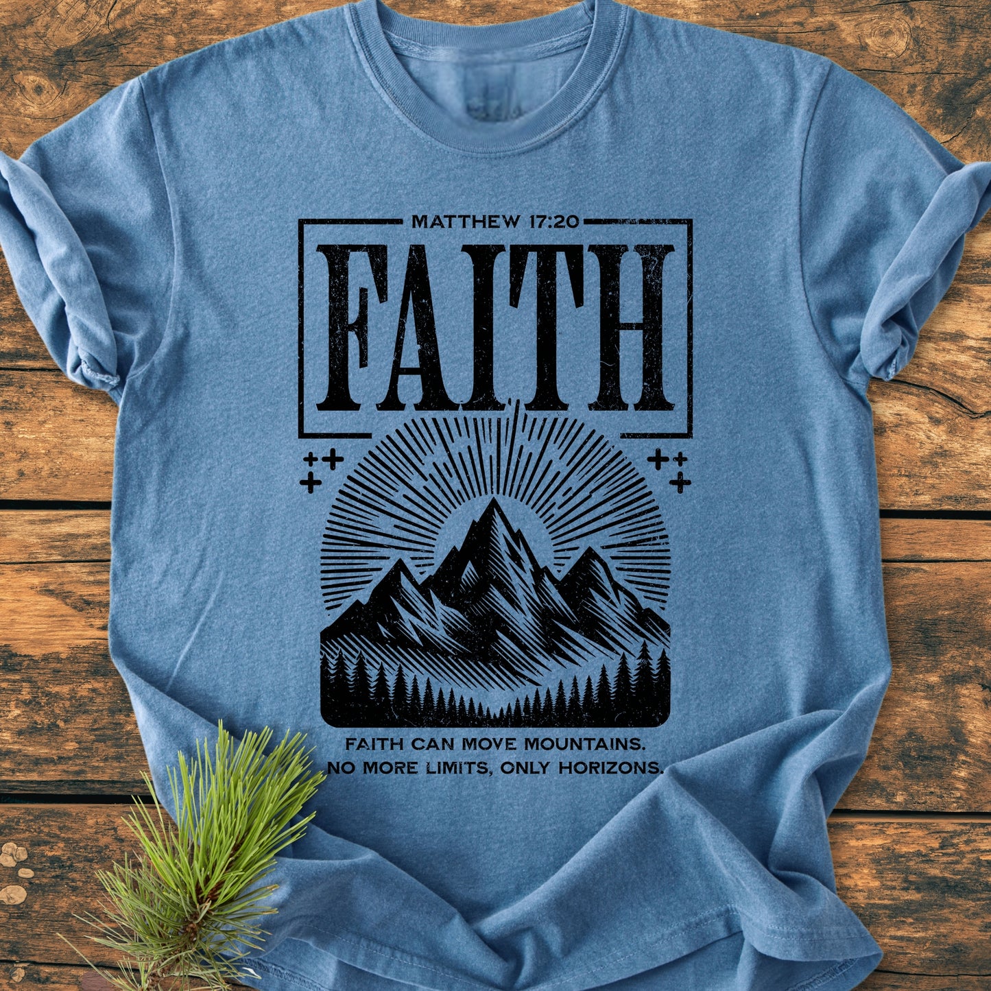 Faith Moves Mountains - Vintage Wash Tee features MATTHEW 17:20 and FAITH with a mountain range and sunburst design, slogan: FAITH CAN MOVE MOUNTAINS. NO MORE LIMITS, ONLY HORIZONS.